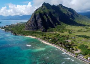 Aerial view of an island in hawaii with water surrounding