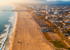 Aerial photo of a beach and cityscape in Santa Monica.